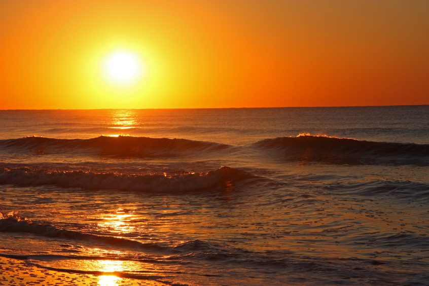 The sun rises over a vacation rental paradise on Folly Beach, South Carolina